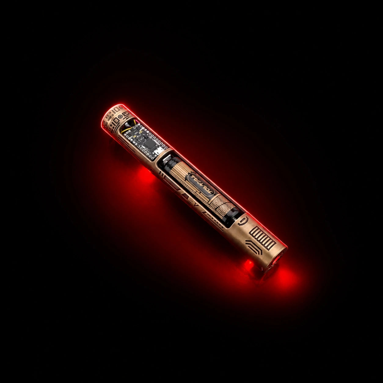 Open brass Maul core showing the Proffie soundboard and internal electronics with red illumination